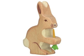 wooden toy of hare holding a carrot
